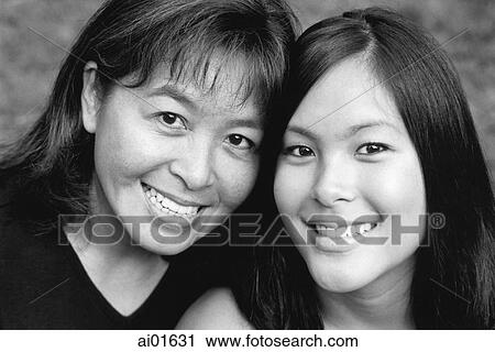 Mother and daughter smiling, portrait View Large Photo Image Stock Image - Mother and daughter smiling, portrait. Fotosearch