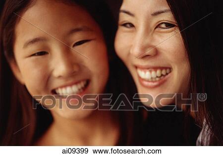 Mother and daughter, smiling View Large Photo Image Stock Photo - Mother and daughter, smiling. Fotosearch