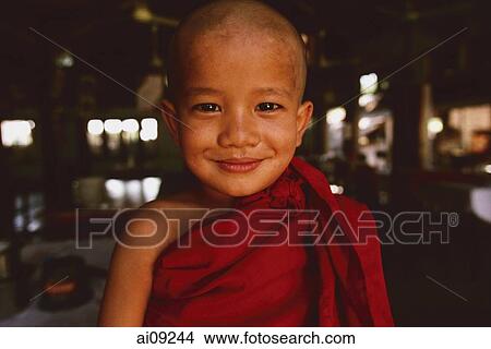 Myanmar (Burma), Bagan, 4 year old novice monk, portrait. View Large Photo Image Picture - Myanmar (Burma), Bagan, 4 year old novice monk, portrait.. Fotosearch