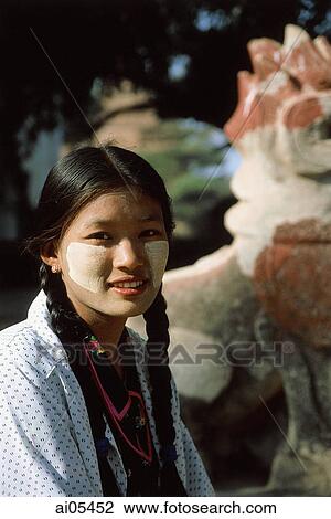 Myanmar (Burma), Bagan, Portrait of woman with painted face View Large Photo Image Stock Image - Myanmar (Burma), Bagan, Portrait of woman with painted face. Fotosearch