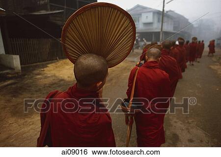 Myanmar (Burma), Bago, Buddhist monks line up to collect alms. View Large Photo Image Stock Photograph - Myanmar (Burma), Bago, Buddhist monks line up to collect alms.. Fotosearch