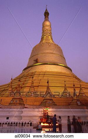 Myanmar (Burma), Bago, Worshippers at Shwemawdaw Paya at dusk. View Large Photo Image Picture - Myanmar (Burma), Bago, Worshippers at Shwemawdaw Paya at dusk.. Fotosearch