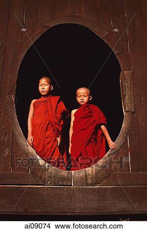 Picture - Myanmar (Burma), Inle Lake, Novice monks at Shweyaunghwe Kyaung monastery.. Fotosearch