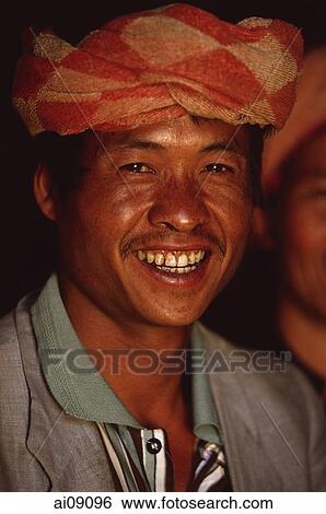 Myanmar (Burma), Near Kalaw, Pa-o man looking at camera, smiling View Large Photo Image Stock Photograph - Myanmar (Burma), Near Kalaw, Pa-o man looking at camera, smiling. Fotosearch