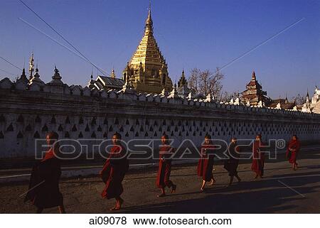 Myanmar (Burma), Nyaungshwe, Inle lake, Buddhist monks walking pass Yadanaman Aung Paya. View Large Photo Image Stock Photo - Myanmar (Burma), Nyaungshwe, Inle lake, Buddhist monks walking pass Yadanaman Aung Paya.. Fotosearch