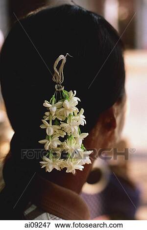 Myanmar (Burma), Pyay, Jasmine hair garland decorates woman's head. View Large Photo Image Stock Photo - Myanmar (Burma), Pyay, Jasmine hair garland decorates woman's head.. Fotosearch