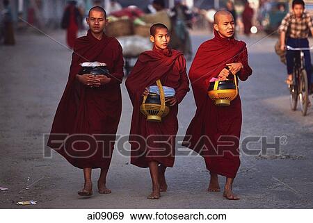 Myanmar (Burma), Sangaing, Buddhist monks returning to monastery after collecting alms. View Large Photo Image Stock Photo - Myanmar (Burma), Sangaing, Buddhist monks returning to monastery after collecting alms.. Fotosearch
