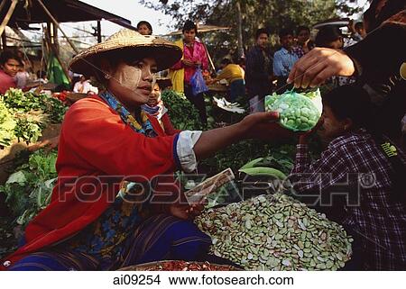 Myanmar (Burma), Sangaing, Woman selling beans at morning market. View Large Photo Image Picture - Myanmar (Burma), Sangaing, Woman selling beans at morning market.. Fotosearch