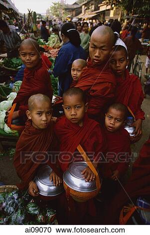 Myanmar (Burma), Sangaing, Young novice monks at Sangaing market. View Large Photo Image Stock Image - Myanmar (Burma), Sangaing, Young novice monks at Sangaing market.. Fotosearch