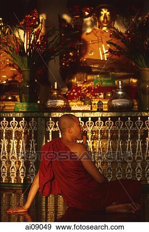 Myanmar (Burma), Yangon, Buddhist monk relaxing at Shwedagon Paya. View Large Photo Image Stock Photo - Myanmar (Burma), Yangon, Buddhist monk relaxing at Shwedagon Paya.. Fotosearch