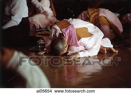 Picture - Myanmar (Burma), Yangon (Rangoon), A group of young Buddhist monks meditating at a meditation center.. Fotosearch