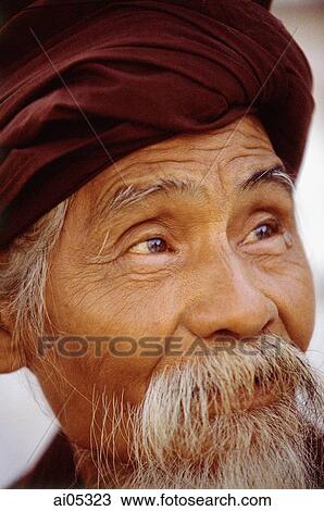 Myanmar (Burma), Yangon (Rangoon), An elderly Buddhist monk looking towards the Shwedagon Pagoda. View Large Photo Image Stock Image - Myanmar (Burma), Yangon (Rangoon), An elderly Buddhist monk looking towards the Shwedagon Pagoda.. Fotosearch