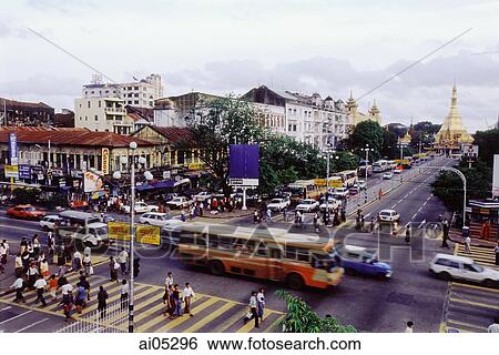 Myanmar (Burma), Yangon (Rangoon), Busy intersection, views of old colonial buildings. View Large Photo Image Stock Photograph - Myanmar (Burma), Yangon (Rangoon), Busy intersection, views of old colonial buildings.. Fotosearch