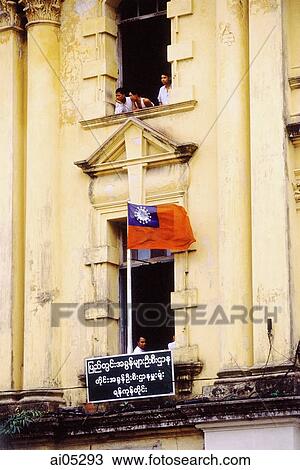 Myanmar (Burma), Yangon (Rangoon), Flag in windowsill of old colonial building. View Large Photo Image Stock Image - Myanmar (Burma), Yangon (Rangoon), Flag in windowsill of old colonial building.. Fotosearch
