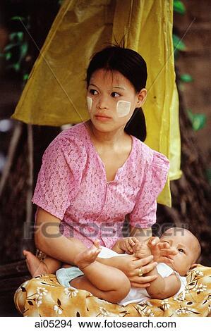 Myanmar (Burma), Yangon (Rangoon), Mother and child, streetscene. View Large Photo Image Picture - Myanmar (Burma), Yangon (Rangoon), Mother and child, streetscene.. Fotosearch