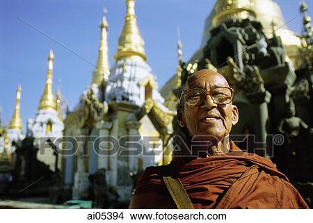 Myanmar (Burma), Yangon (Rangoon), Portrait of Buddhist monk at Shwedagon Pagoda View Large Photo Image Picture - Myanmar (Burma), Yangon (Rangoon), Portrait of Buddhist monk at Shwedagon Pagoda. Fotosearch