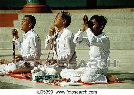 Myanmar (Burma), Yangon (Rangoon), Worshippers praying at the Shwedagon Pagoda View Large Photo Image Stock Image - Myanmar (Burma), Yangon (Rangoon), Worshippers praying at the Shwedagon Pagoda. Fotosearch