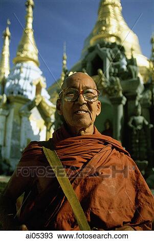 Myanmar (Burma), Yangon (Rangoon), Portrait of Buddhist monk at Shwedagon Pagoda View Large Photo Image Stock Image - Myanmar (Burma), Yangon (Rangoon), Portrait of Buddhist monk at Shwedagon Pagoda. Fotosearch