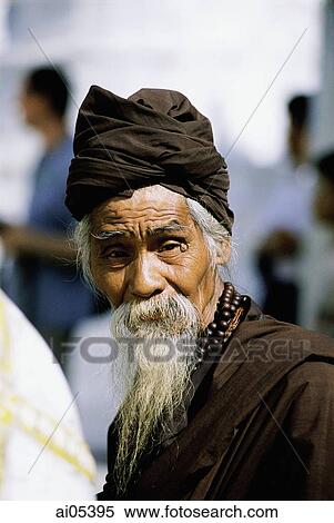 Myanmar (Burma), Yangon (Rangoon), Portrait of elderly man at Shwedagon Pagoda View Large Photo Image Stock Photography - Myanmar (Burma), Yangon (Rangoon), Portrait of elderly man at Shwedagon Pagoda. Fotosearch