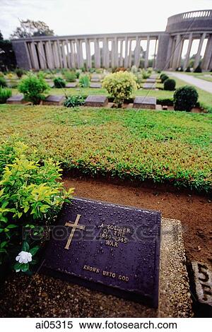 Myanmar (Burma), Yangon (Rangoon), The grave of an unknown soldier at Htaukkyant War Cemetery. View Large Photo Image Stock Photography - Myanmar (Burma), Yangon (Rangoon), The grave of an unknown soldier at Htaukkyant War Cemetery.. Fotosearch