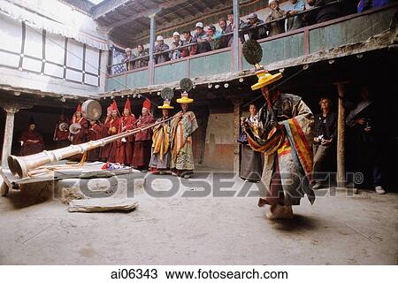 Stock Image - Nepal, Mustang, Buddhist Lamas perform ceremonial dances during Teeji Festival.. Fotosearch