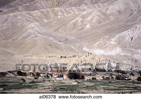 Stock Photo - Nepal, Mustang, town of Lo Manthang, surrounded by mountains.. Fotosearch