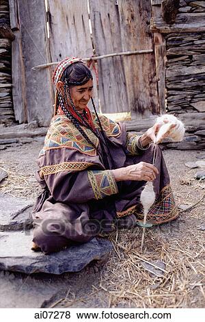 Pakistan, Chitral, Rumbur Valley, Kailashgram village, Elderly woman weaving wool. View Large Photo Image Stock Photo - Pakistan, Chitral, Rumbur Valley, Kailashgram village, Elderly woman weaving wool.. Fotosearch