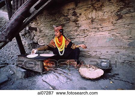 Pakistan, Northern Areas, Chitral, Bumberet, Kailash woman making chapatis. View Large Photo Image Stock Photo - Pakistan, Northern Areas, Chitral, Bumberet, Kailash woman making chapatis.. Fotosearch