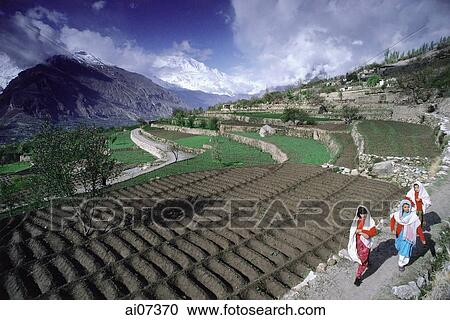 Pakistan, Northern Areas, Hunza Valley, Karimabad, Schoolgirls walking on trail. View Large Photo Image Stock Image - Pakistan, Northern Areas, Hunza Valley, Karimabad, Schoolgirls walking on trail.. Fotosearch