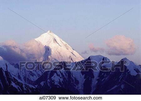 Pakistan, Northern Areas, Hunza Valley, Rakaposhi Peak at dawn. View Large Photo Image Stock Photo - Pakistan, Northern Areas, Hunza Valley, Rakaposhi Peak at dawn.. Fotosearch