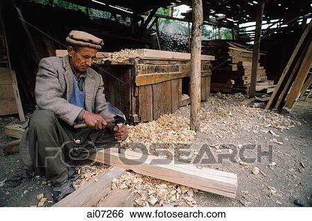 Pakistan, Northern Areas, Hunza Valley, Karimabad, Carpenter at work. View Large Photo Image Stock Photograph - Pakistan, Northern Areas, Hunza Valley, Karimabad, Carpenter at work.. Fotosearch
