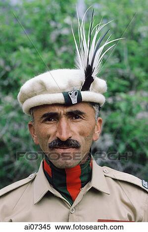 Pakistan, Northern Areas, Hunza Valley, Karimabad, Portrait of army officer in uniform and hat. View Large Photo Image Stock Photography - Pakistan, Northern Areas, Hunza Valley, Karimabad, Portrait of army officer in uniform and hat.. Fotosearch