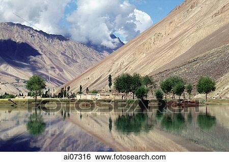 Stock Photograph - Pakistan, Northern Areas, near Chitral, Traditional house on Phander Valley and River.. Fotosearch