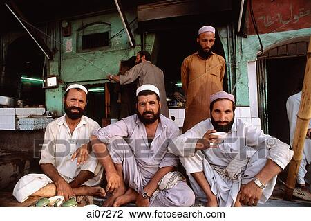 Pakistan, Peshawar, Muslim men gather to rest. View Large Photo Image Stock Image - Pakistan, Peshawar, Muslim men gather to rest.. Fotosearch