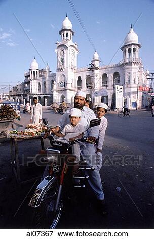 Pakistan, Punjab, Lahore, Family on motorcycle. View Large Photo Image Stock Photo - Pakistan, Punjab, Lahore, Family on motorcycle.. Fotosearch