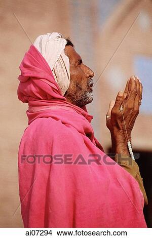 Picture - Pakistan, Punjab, Multan, Shrine of Baha-Ud-Din Zakaria, Man praying.. Fotosearch