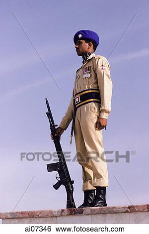Pakistan, Sind, Karachi, Quaide-E-Azam, Army guard holding gun on duty. View Large Photo Image Stock Photograph - Pakistan, Sind, Karachi, Quaide-E-Azam, Army guard holding gun on duty.. Fotosearch