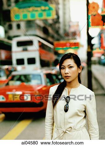 Portrait of female executive on street. View Large Photo Image Stock Image - Portrait of female executive on street.. Fotosearch