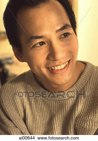 Portrait of man, smiling View Large Photo Image Picture - Portrait of man, smiling. Fotosearch