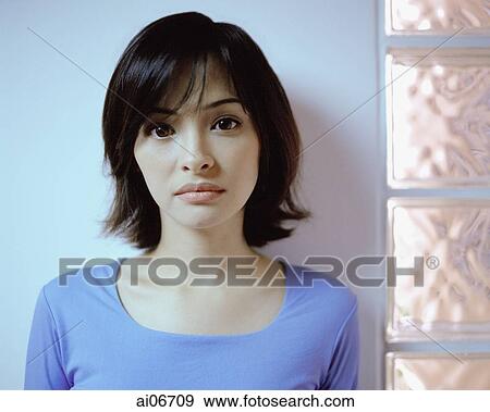Stock Photo - Portrait of young woman. Fotosearch