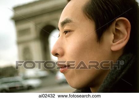 Profile of man, Arc de Triomphe in background. View Large Photo Image Stock Image - Profile of man, Arc de Triomphe in background.. Fotosearch