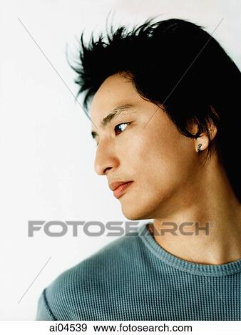 Stock Photo - Profile of young man, white background.. Fotosearch