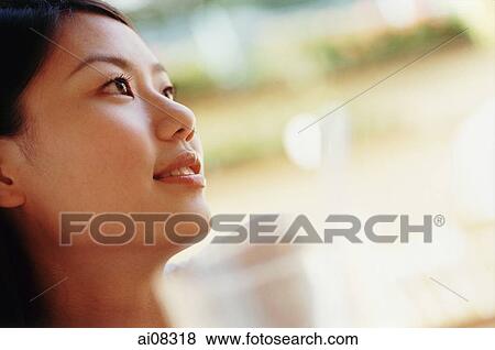 Profile of young woman smiling. View Large Photo Image Stock Photo - Profile of young woman smiling.. Fotosearch