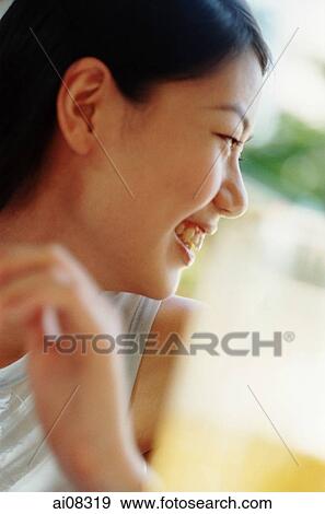 Profile of young woman smiling. View Large Photo Image Stock Photo - Profile of young woman smiling.. Fotosearch