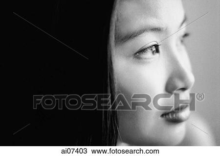Stock Image - Profile of young woman. Fotosearch