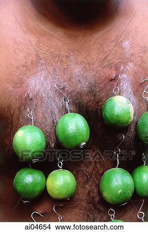 Picture - Singapore, Body piercings at Thaipusam festival. Fotosearch