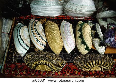 Singapore, Embroidered prayer caps (called songkoks) are piled high at a store near the Sultan Mosque. View Large Photo Image Stock Image - Singapore, Embroidered prayer caps (called songkoks) are piled high at a store near the Sultan Mosque.. Fotosearch