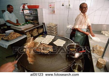 Singapore, Men preparing food in one of the many stalls along Arab Street. View Large Photo Image Stock Image - Singapore, Men preparing food in one of the many stalls along Arab Street.. Fotosearch
