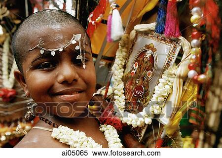 Singapore, Young devotee with Hindu icons during Thaipusam festival View Large Photo Image Stock Photography - Singapore, Young devotee with Hindu icons during Thaipusam festival. Fotosearch