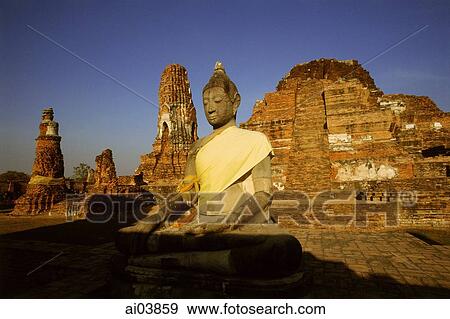 Thailand, Ayutthaya, Buddha in bright yellow robe. View Large Photo Image Stock Photo - Thailand, Ayutthaya, Buddha in bright yellow robe.. Fotosearch